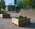 Moveable timber planters and seating for traffic management at campus 2