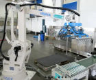 Okura Ai700 robotic palletiser