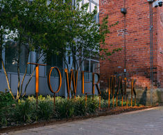 Bespoke corten steel letters and WAY2GO totems for Marshall's Mill