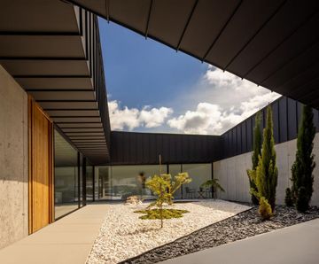 Zinc roofing and external wall cladding for contemporary home