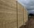Timber acoustic barriers reduce stadium noise for new housing 4