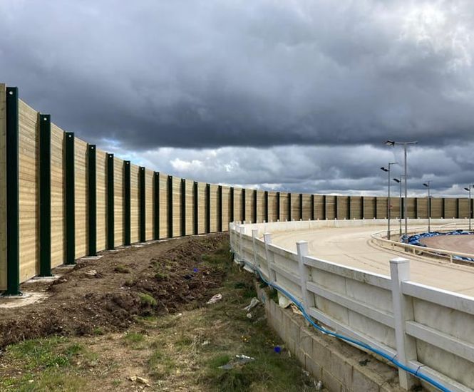 Timber acoustic barriers reduce stadium noise for new housing