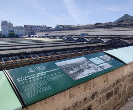 Enamelled lava stone interpretation signage at railway station
