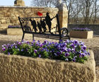 Rustic stone-effect polyethylene trough planter