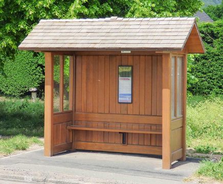 Open-fronted timber bus shelters with pitched roof