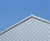Zinc roof and cladding creates sculptural facade for sports hall 3