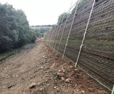 Textomur reinforced soil slope design for road and path widening scheme