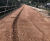 Textomur reinforced soil slope design for road and path widening scheme 1