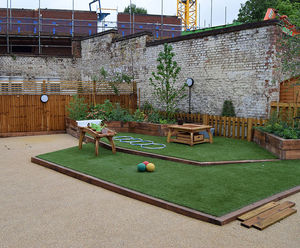 Transforming a car park into a garden play space for school