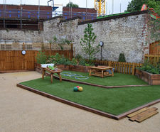 Transforming a car park into a garden play space for school