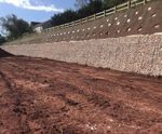 Earth anchors stabilise 6m-high, 137m-long slope at business park