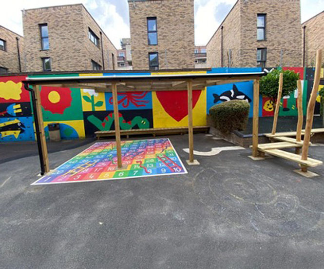 Transformation of tarmac play area for primary school