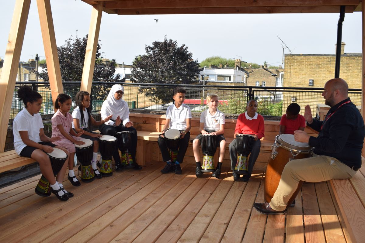 Images for Outdoor classrooms with seating and green roofs for school
