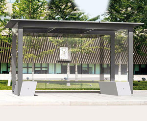 Self - freestanding steel and glass waiting shelter with concrete base