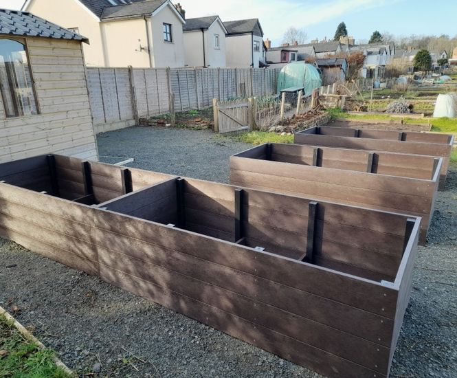 Raised bed planter kits in recycled plastic