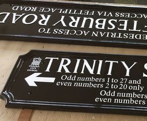 Cast metal street nameplates