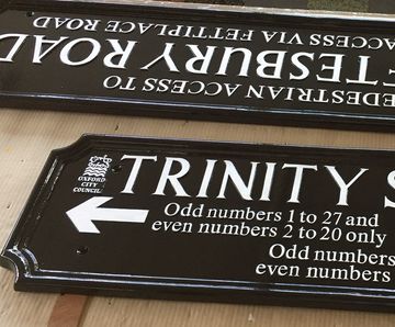 Cast metal street nameplates