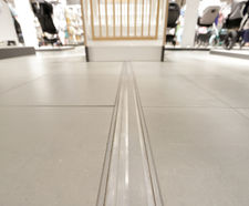 Expansion joints and entrance matting for sports venue