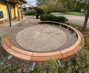 12 bespoke curved benches for primary school