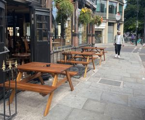 Iroko hardwood picnic tables for Millers pub, Kings Cross, London