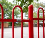Bow top fencing matches primary school colour in Kent - on this page