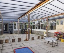 Canopy provides outdoor classroom and play space for school