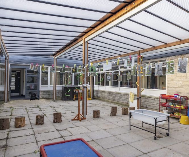 Canopy provides outdoor classroom and play space for school