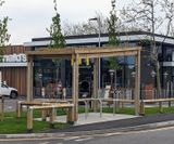 Cycle shelter with sedum roof and bike stands - McDonalds - on this page