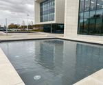 Mirror pools and natural, oval pond created at Fujifilm House