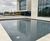 Mirror pools and natural, oval pond created at Fujifilm House 0