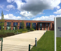 Decorative, bonded, colourful surfacing for new schools