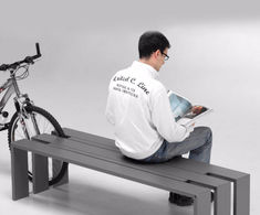 Toso - powder-coated steel outdoor bench with integrated bike rack