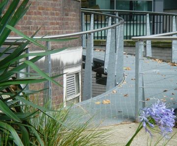 Gratings for elevated walkway at London University