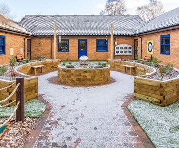 Bespoke wooden raised planters for school's sensory garden