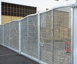 Bespoke gates secure parking area at mixed-use development - on this page
