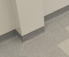 Floormitres, cove formers and capping strips for hospital floors