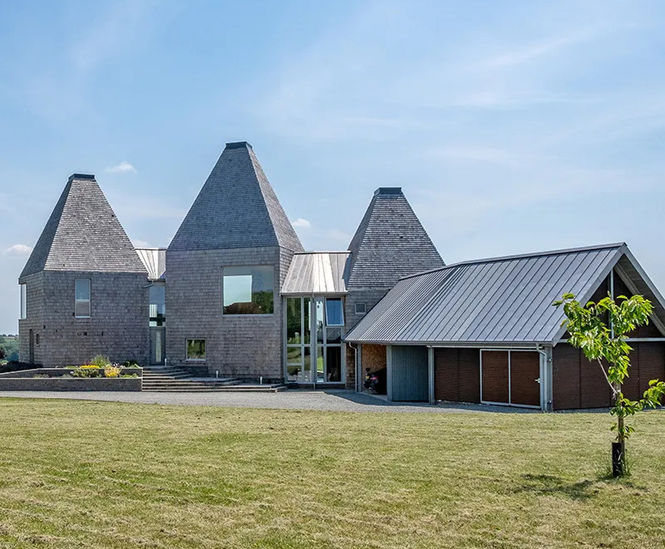 Corten louvres used as cladding and brise soleil for rural home