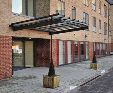 Baskeyfield Entrance Canopy - steel and glass wall-mounted shelter