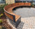 Easthorpe - contemporary semi-circular steel-framed timber seat 0