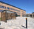 Linear - timber and steel cycle shelter with polycarbonate roof 3
