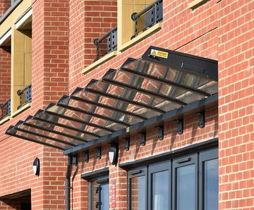Stockton Entrance Canopy - aluminium and glass wall-mounted shelter