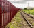 Steel palisade fencing secures timber business perimeter 0