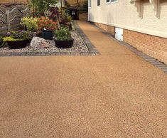 Natratex Cotswold surfacing transforms gravel drive
