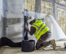 Basement waterproofing for 21 community houses
