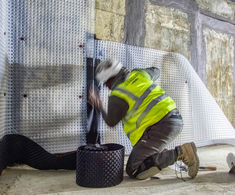 Basement waterproofing for 21 community houses