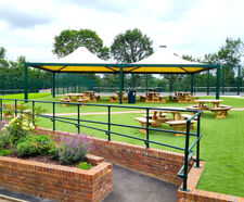 Airone shelters cover school's outdoor seating and classroom area