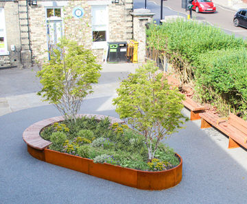 Bespoke corten planter bench and seating for school entrance