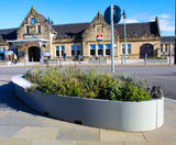 Bespoke planters and seating help revitalise train station - on this page