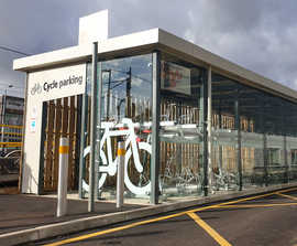 Bespoke cycle hub with 2-tier bike racks for railway station
