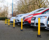 Yellow lockable fold-down steel post for driveways and parking spaces - on this page